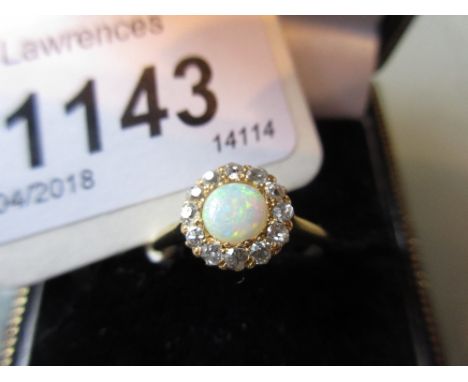 18ct Yellow gold opal and diamond flower head ring