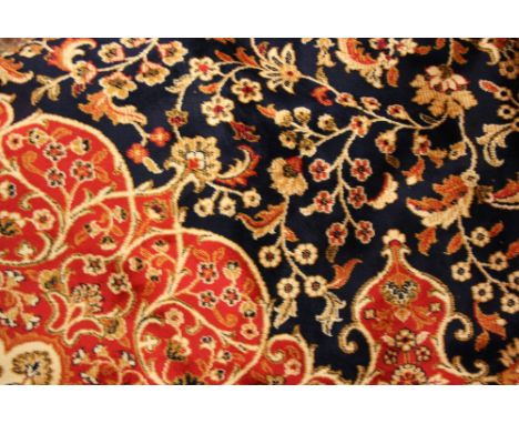 Blue ground Kashan pattern machine carpet, 2.8m x 2m