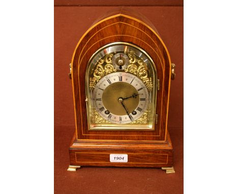 Edwardian rosewood and line inlaid lancet shaped bracket clock with gilt brass mounted case, the brass dial with silvered cha