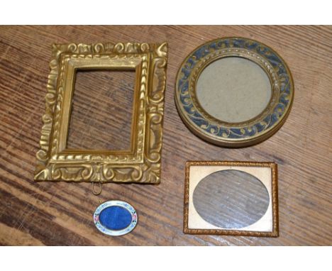 Miniature Florentine style rectangular gilt picture frame, similar circular frame, miniature rectangular copper frame and a v