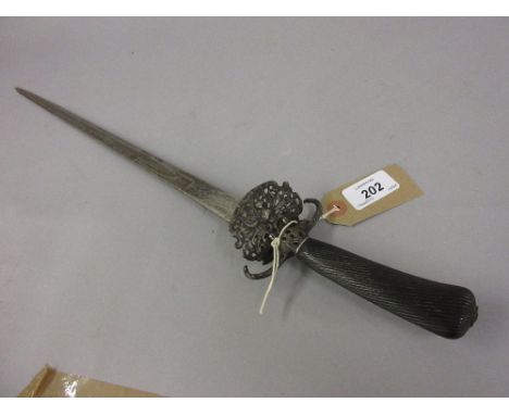 Antique ebony handled hunting sword, having pierced guard with single fuller blade, blade 18.25ins long