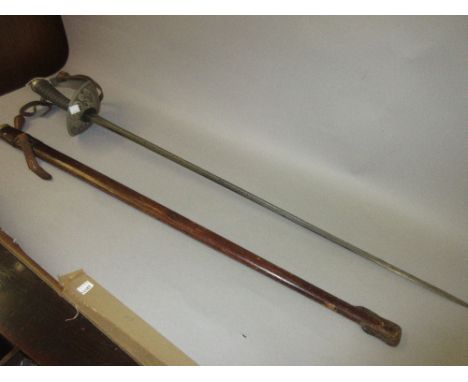 Army Officers dress sword with wire bound shagreen grip, engraved steel hilt and leather covered scabbard