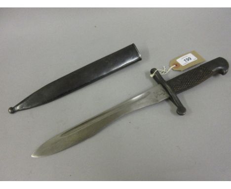 Small Spanish bayonet having wooden grip with metal scabbard, the blade marked Toledo, No. 5527D, the scabbard No. 5201G