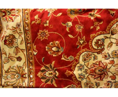 Red ground Kashan pattern machine carpet, 2.3m x 1.6m