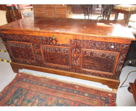 Large late 17th / 18th Century Italian cedar wood cassone, the heavy hinged cover above a carved and poker work decorated fro