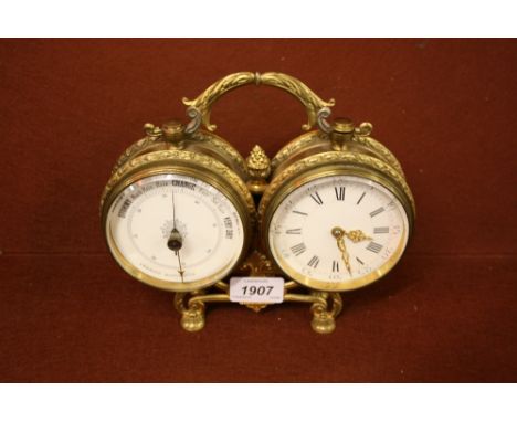Gilt brass clock / barometer with swing carrying handle and circular enamel dials with Roman numerals