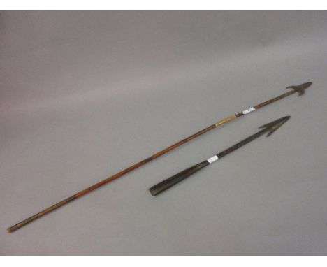 Antique iron barbed spear head, together with an antique arrow (at fault)