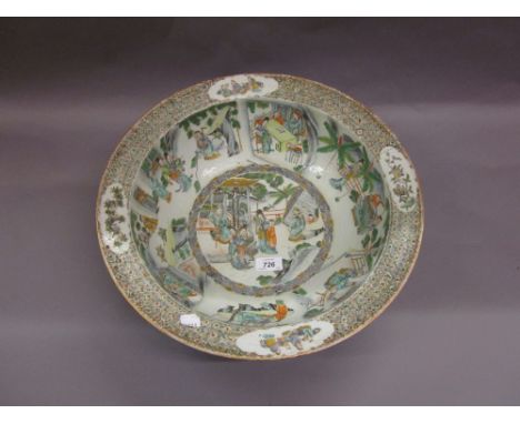 Chinese famille verte basin decorated with panels of figures in interior and garden scenes, 16.5ins diameter (with riveted ha