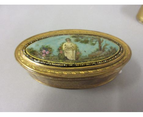 Antique gilt metal oval snuff box, the hinged lid inset with enamel, depicting the risen Christ (restored)
