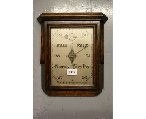 1930's Oak cased Dollond barometer with silvered dial together with a arved oak cased aneroid barometer, the dial inscribed K