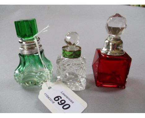 Green / clear glass perfume bottle with matching green stopper and white metal mount, another cut glass perfume bottle with w