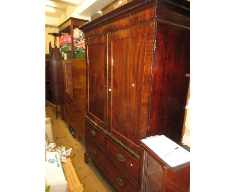 George III mahogany and line inlaid linen press, the moulded dentil cornice above a pair of rectangular panel doors enclosing