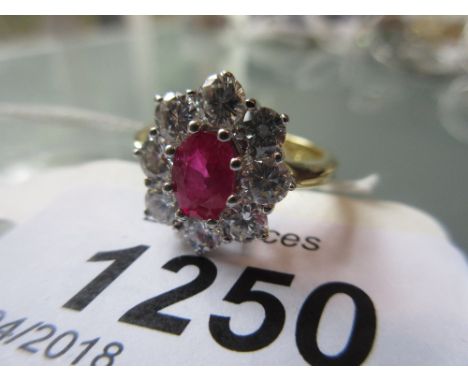 18ct White gold ruby and diamond cluster ring, the ruby approximately 0.96ct, the diamonds approximately 1.50cts