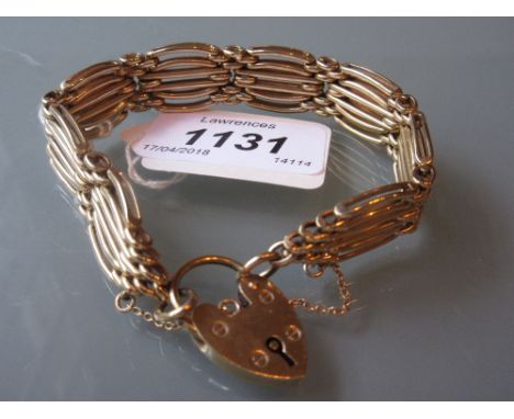Heavy 9ct gold gate link bracelet with padlock clasp