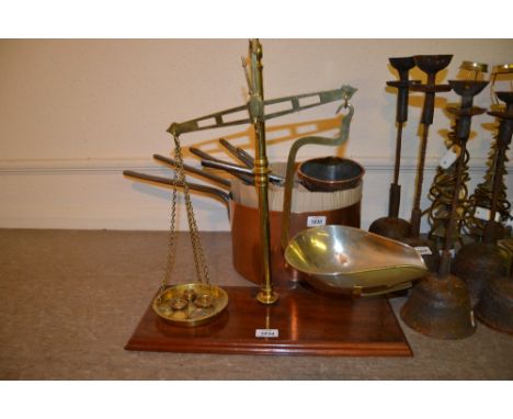 Pair of large 19th Century brass balance scales with weights on a mahogany moulded base