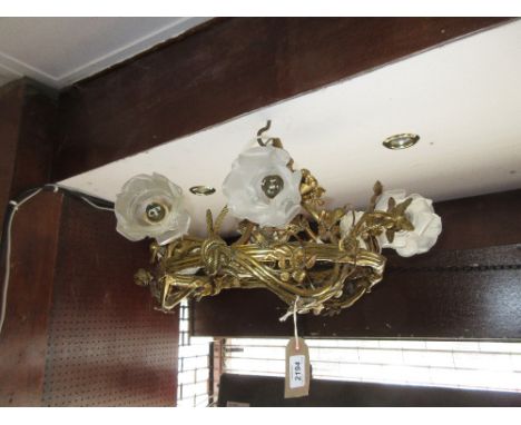 French ormolu circular six branch light fitting with frosted glass petal form shades
