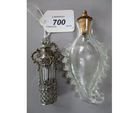 Unusual elaborate blown glass scent flask with engraved decoration and cork stopper, together with a clear glass perfume bott