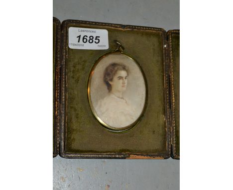 Sidney Slade, watercolour, portrait miniature of a young lady wearing a garnet necklace, signed and dated '05 in an oval bras