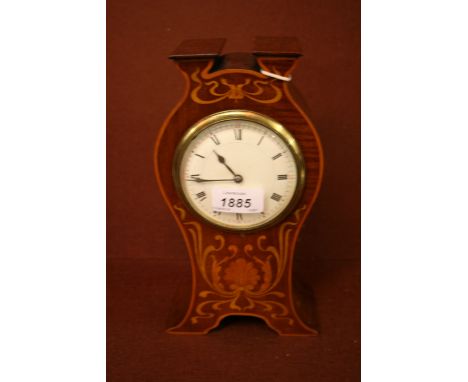 Art Nouveau mahogany boxwood inlaid mantel clock, the enamel dial with Roman and Arabic numerals with a single train movement