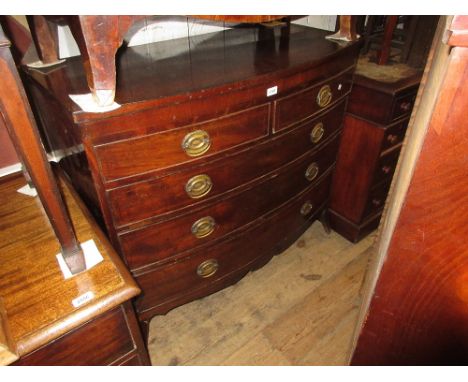 19th Century mahogany bow front chest of two short and three long drawers with oval brass handles and bracket feet