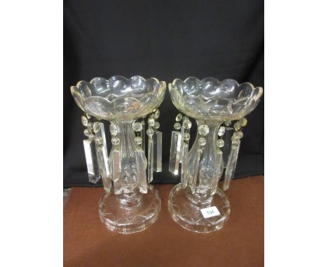 Pair of early 20th Century cut glass candlestick lustres with prismatic glass drops