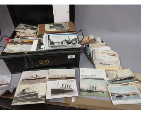 Black tin containing a large collection of various early 20th Century and later topographical post cards including many conti