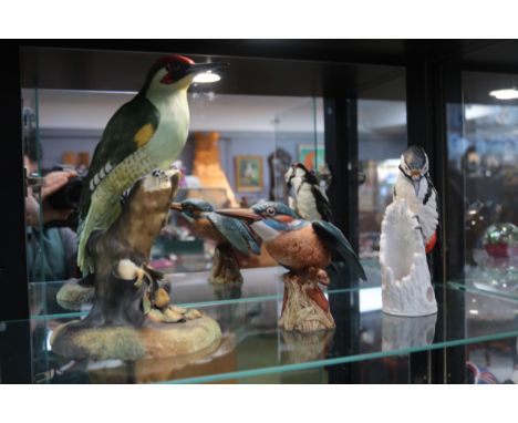 Royal Crown Derby figure of a Wood pecker, Beswick Kingfisher and a Goebel Woodpecker 