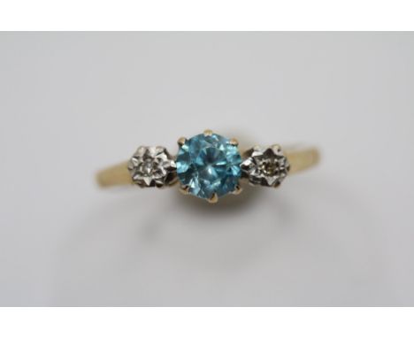 Ladies 18ct Gold Diamond and Aquamarine set 3 stone ring Size N. 2.9g total weight 