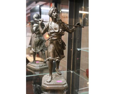 Emile Pinedo 1840 - 1916 Bronzed figure of a walking Arab with stick. 33cm in Height 