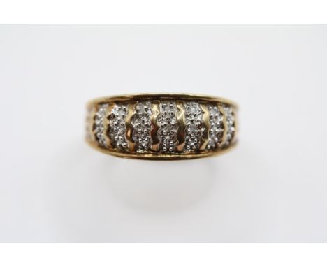 Ladies 9ct Gold Diamond rope design ring Size O. 3.27g total weight 