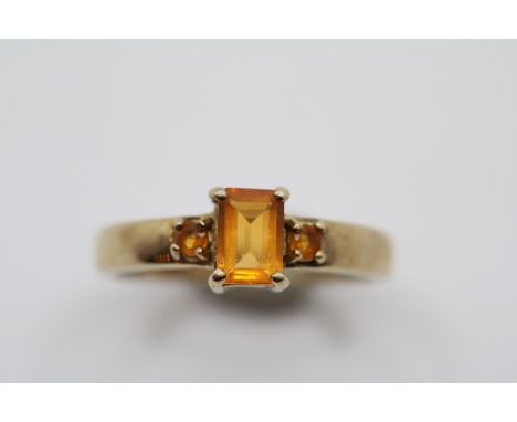 9ct Gold Three Stone Emerald cut fire Opal ring Size N. 2.63g total weight 