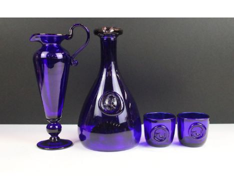 Mid 20th century Holmegaard Danish cobalt blue glass Viking bottle decanter with pouring spout and a round relief Viking face