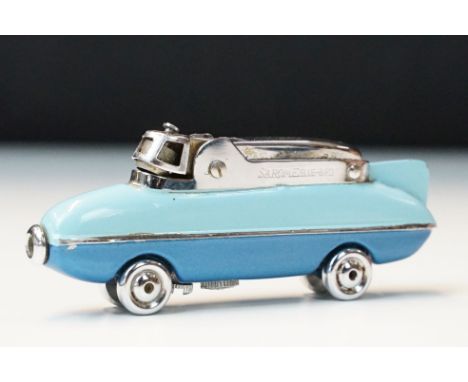 A mid 20th century atomic era Sarome bluebird pocket lighter inm the form of a car. 