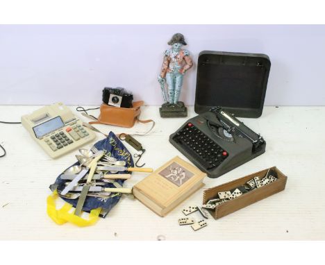 Assorted collectables to include a napoleon cast iron door stop, box of bone dominoes, a sharp printing calculator, the Game 