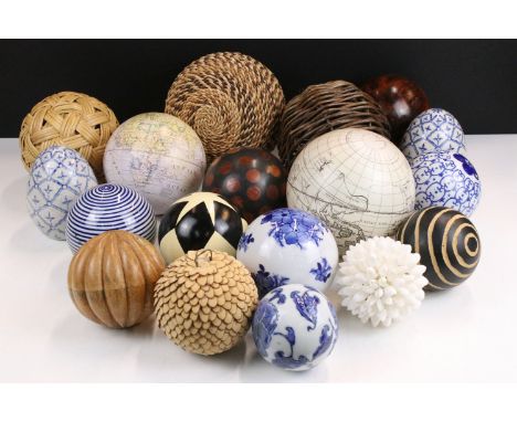 Large quantity of decorative ornamental balls to include wicker, inlaid wooden, blue and white ceramic, black and white and g