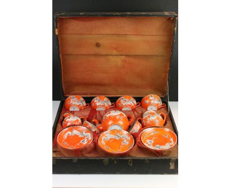 Early 20th century oriental 'Moriage Dragon ware' tea service in fitted box, label to the base of box, comprising of six teac