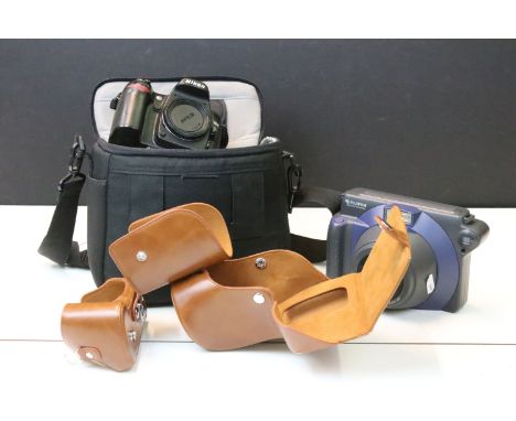 Cameras to include Nikon D80, Fujifilm Instax100 and brown camera case