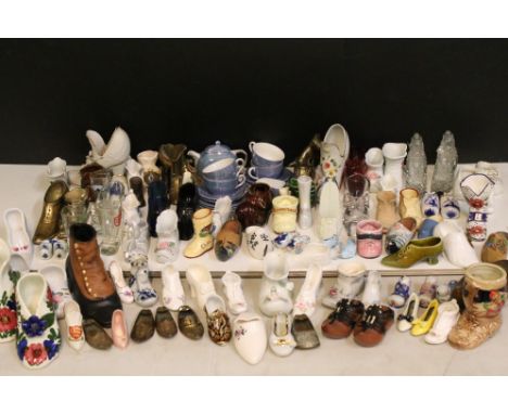 Large assortment of decorative collectable shoes to include ceramics by Royal Doulton, St George, David Michael and Peter Gos