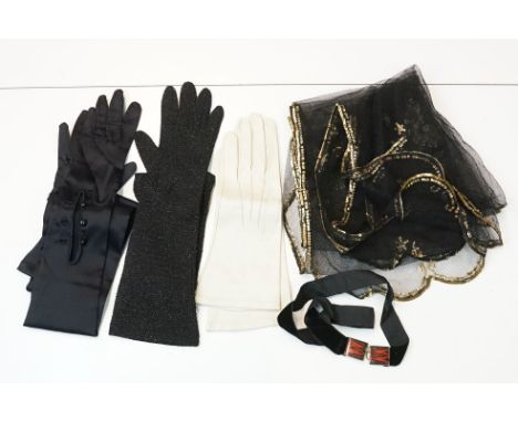 A small group of ladies vintage clothing to include three pairs of evening gloves and a net scarf with gold sequin decoration