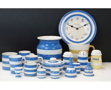 Collection of Cornish Ware blue and white items to include a T Green clock, lidded jar, mugs, sugar jar, cups, mustard pots, 