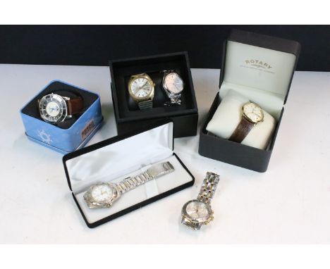 A collection of gents wristwatches to include Pulsar, Tissot and Rotary examples.