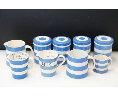 Collection of Cornish ware blue and white items to include set of 4 lidded jars and assortment of jugs including a milk and m