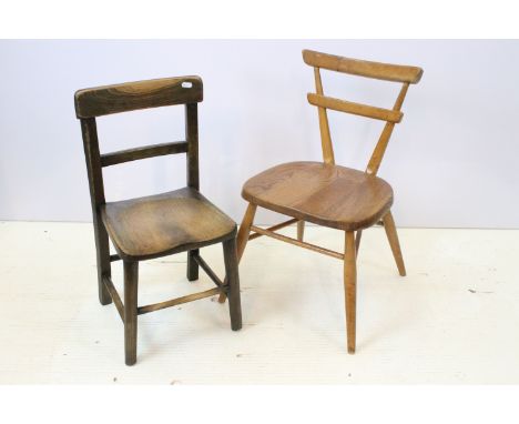 Pair of children's chairs to include a 1950's Ercol stacking school chair, with red dot, H 64cm and a Mahogany example H 62cm