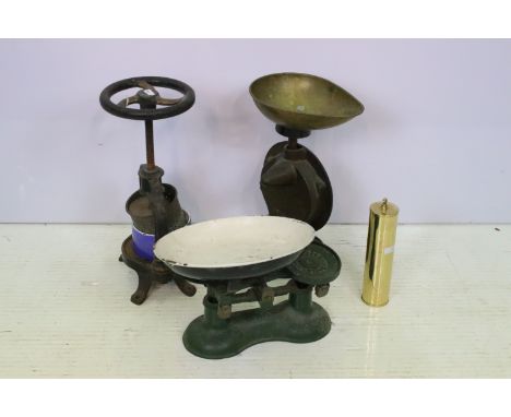 Two sets of scales to include a Salter's family scale, set of Boots balance scales and a metal fruit press.