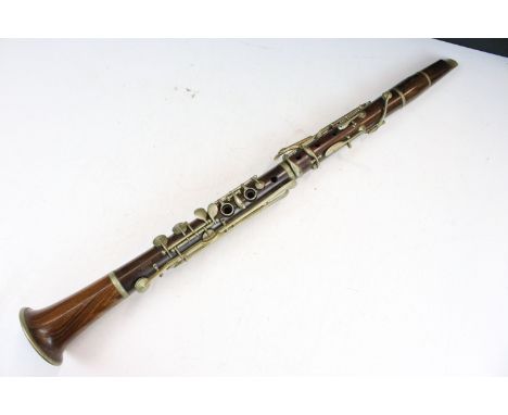 Early 20th Century clarinet with nickel plated fittings and buttons. Signed A Chappell and E Albert. Measures 64cm.