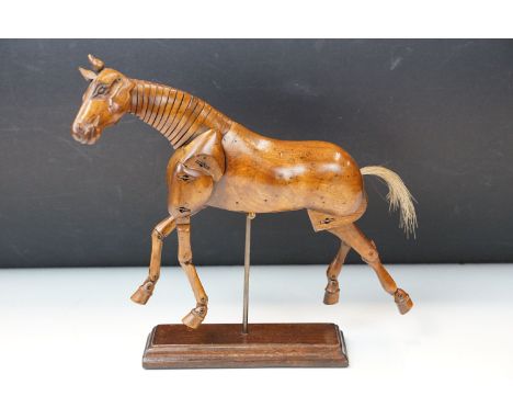Articulated carved  wooden horse mannequin lay figure with horse hair tail on wooden stand, H 26cm