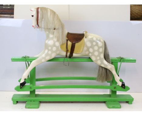 Mid 20th century wooden rocking horse on green rocking stand, hand painted finish, dapple markings, horse hair tail and mane 