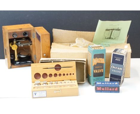 A box of mixed collectables to include balance scales and cased weights, microscope and valves.