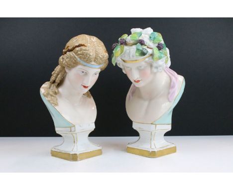 Two 20th century German ceramic Roman busts, one possibly 'Bacchus' the god of wine with a crown made of leaves and grapes, g
