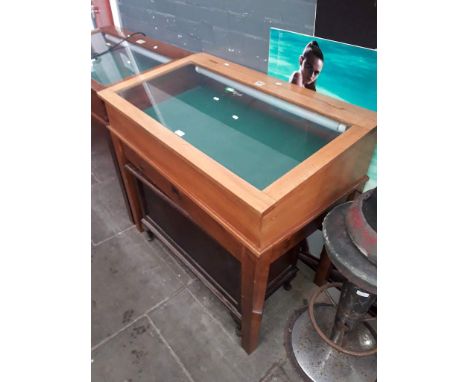 A mahogany cased museum display cabinet on stand with internal light and two keys.Dimensions- height 100cm, width 112cm and d